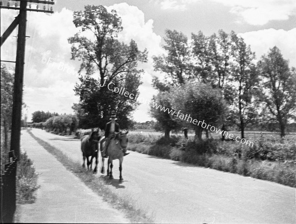 FARMER ON HORSE BACK